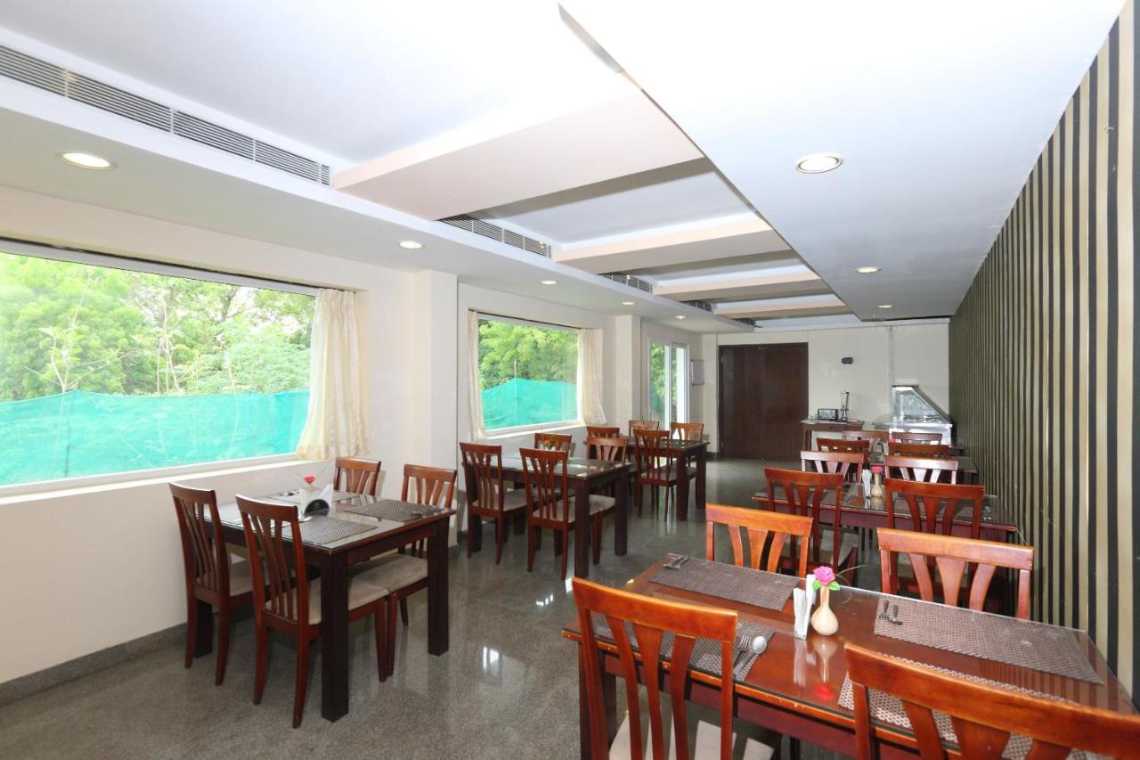 Oyo 15925 Tommaso Hotels And Resorts Sriperumbudur Bagian luar foto